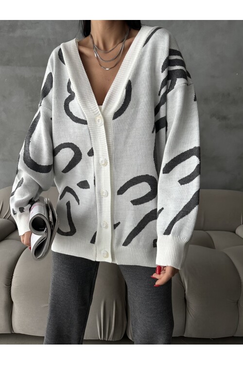 Комплект из трикотажа с брюками и кардиганом