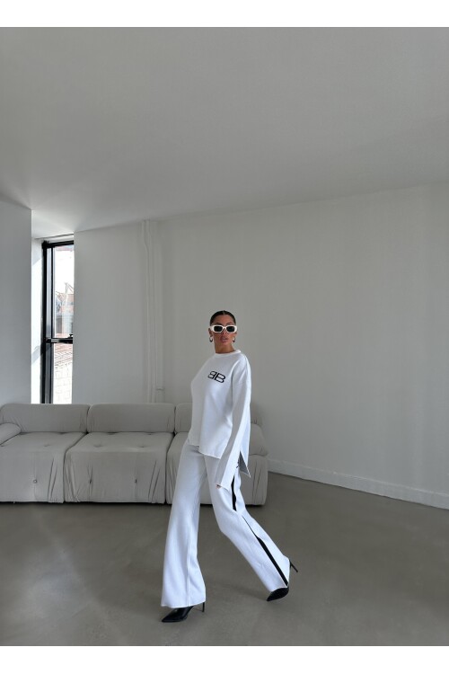 طقم كنزة وبنطلون تريكو مزدوج