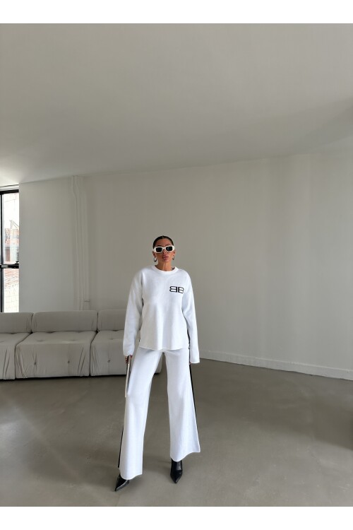 طقم كنزة وبنطلون تريكو مزدوج